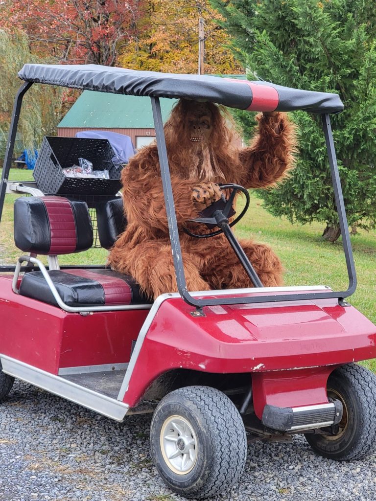 Sasquatch in golf cart